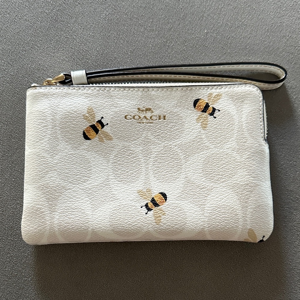 Coach Cream Wristlet with Bee Design